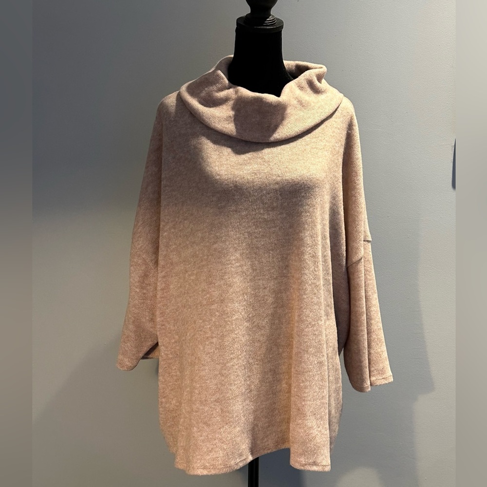 New! Loose fit, dolman sleeve sweater in softest fabric and beige tan color.Boho